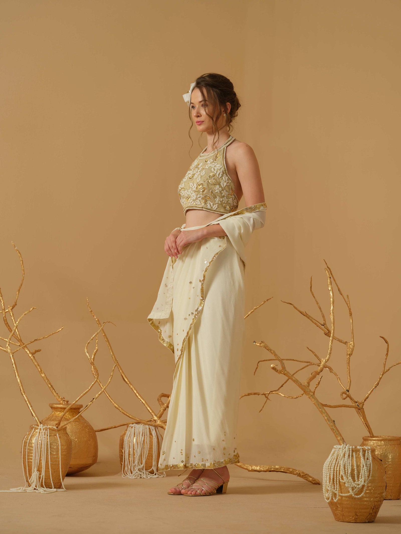 A  Halter Neck Blouse Having  Floral Embroidery