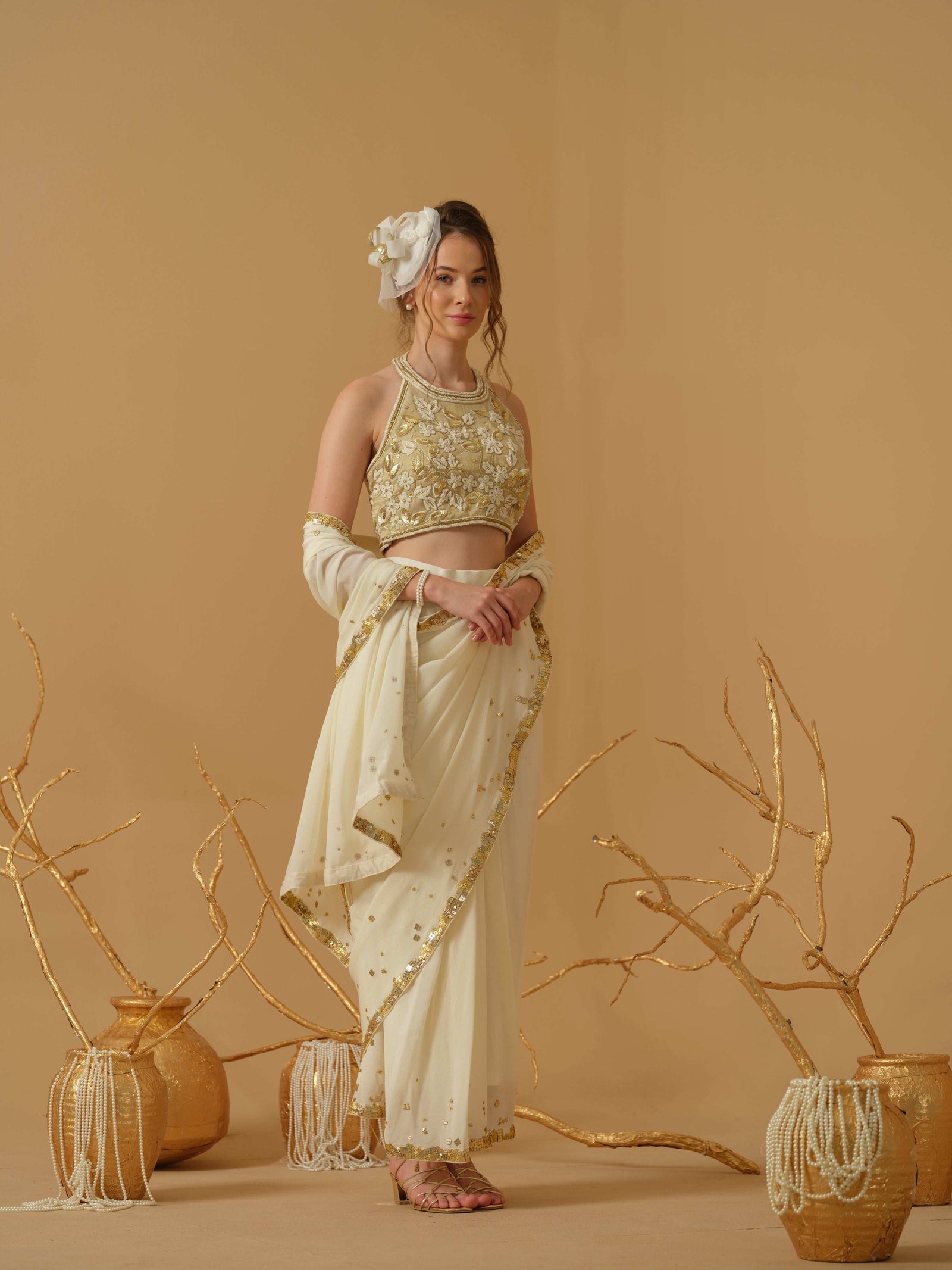 A  Halter Neck Blouse Having  Floral Embroidery