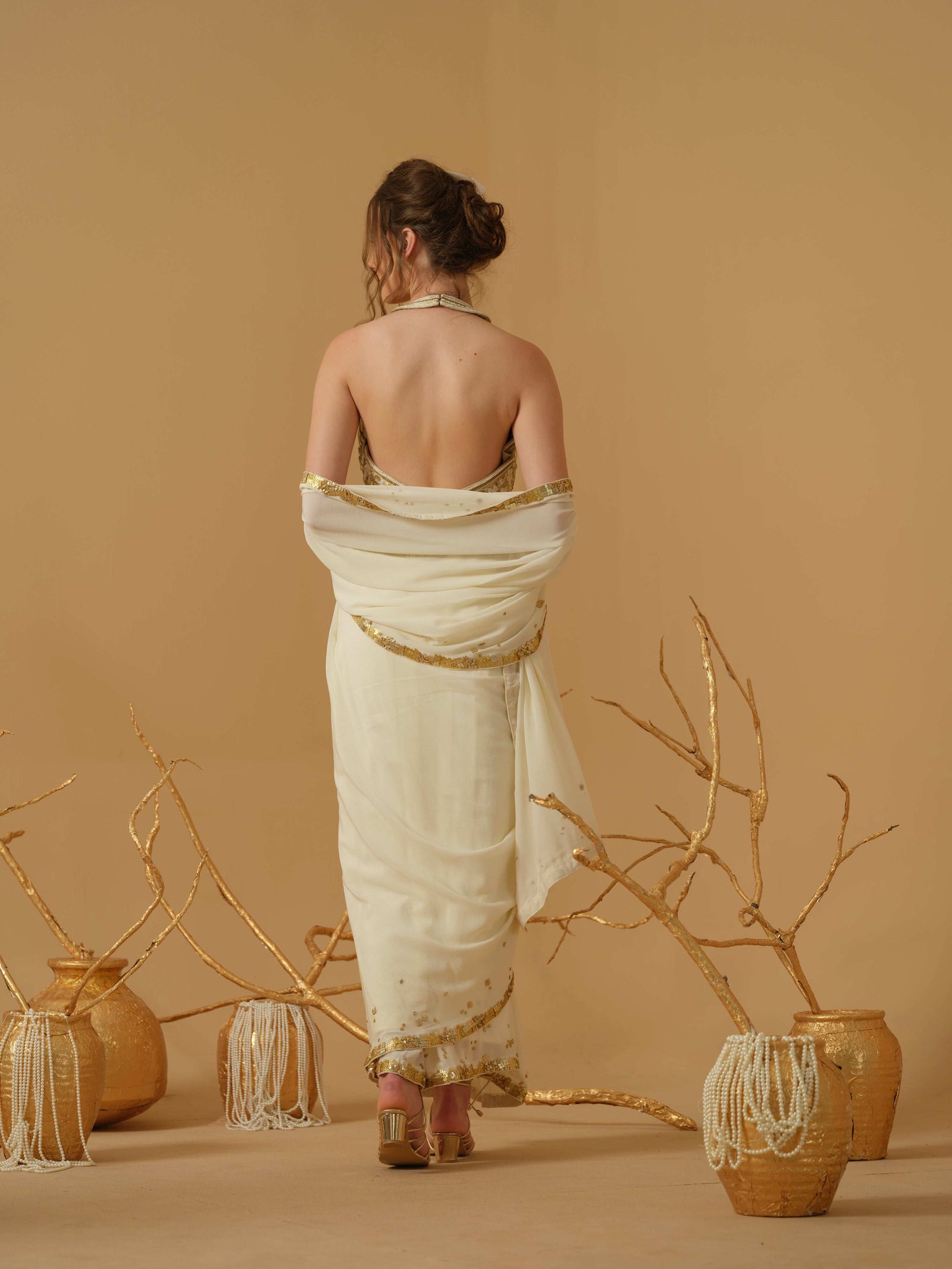 A  Halter Neck Blouse Having  Floral Embroidery