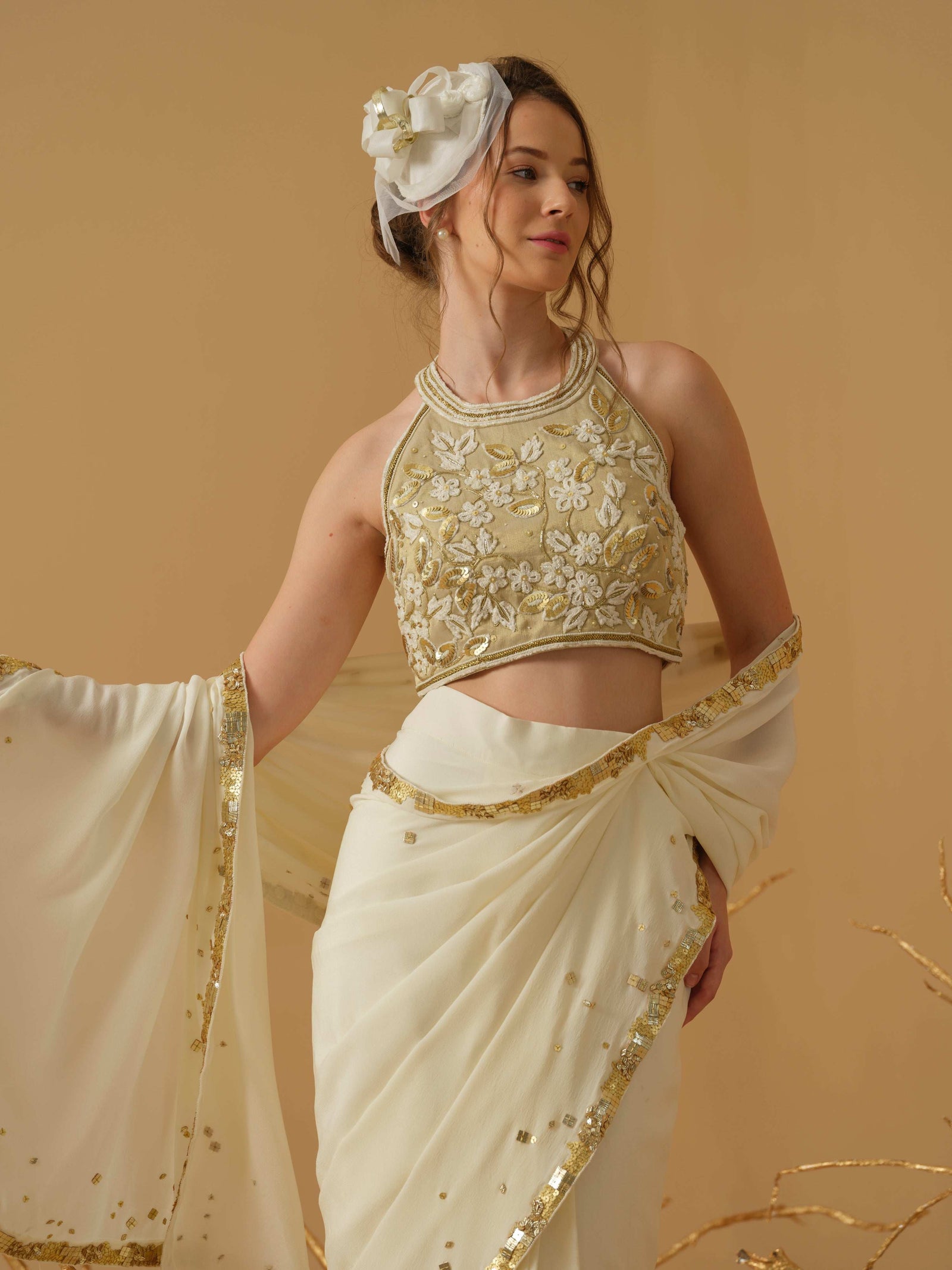 A  Halter Neck Blouse Having  Floral Embroidery