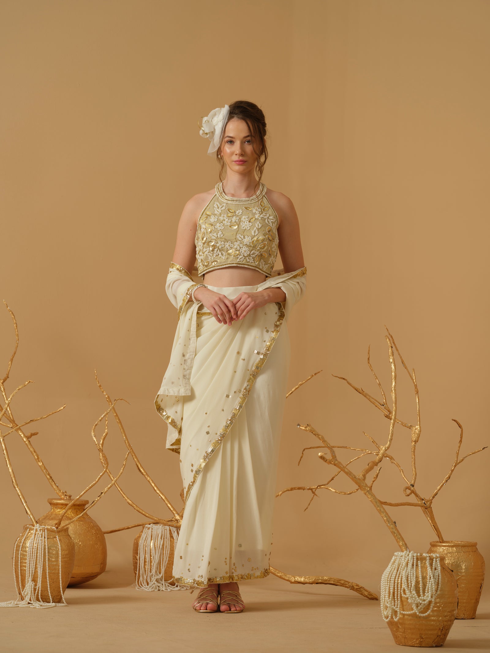 A  Halter Neck Blouse Having  Floral Embroidery