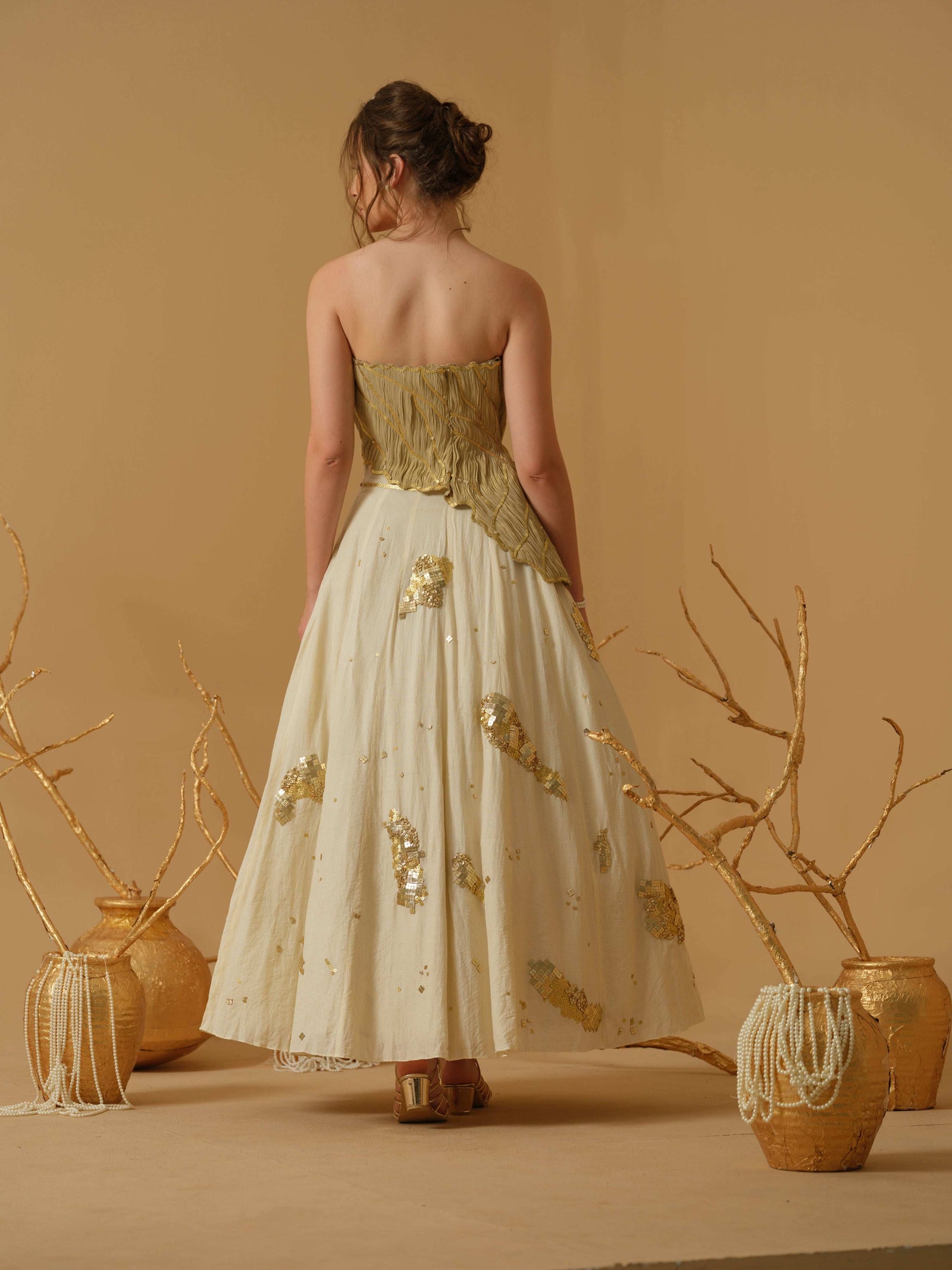 A Flared Skirt Having Scattered Geometrical Embellishment