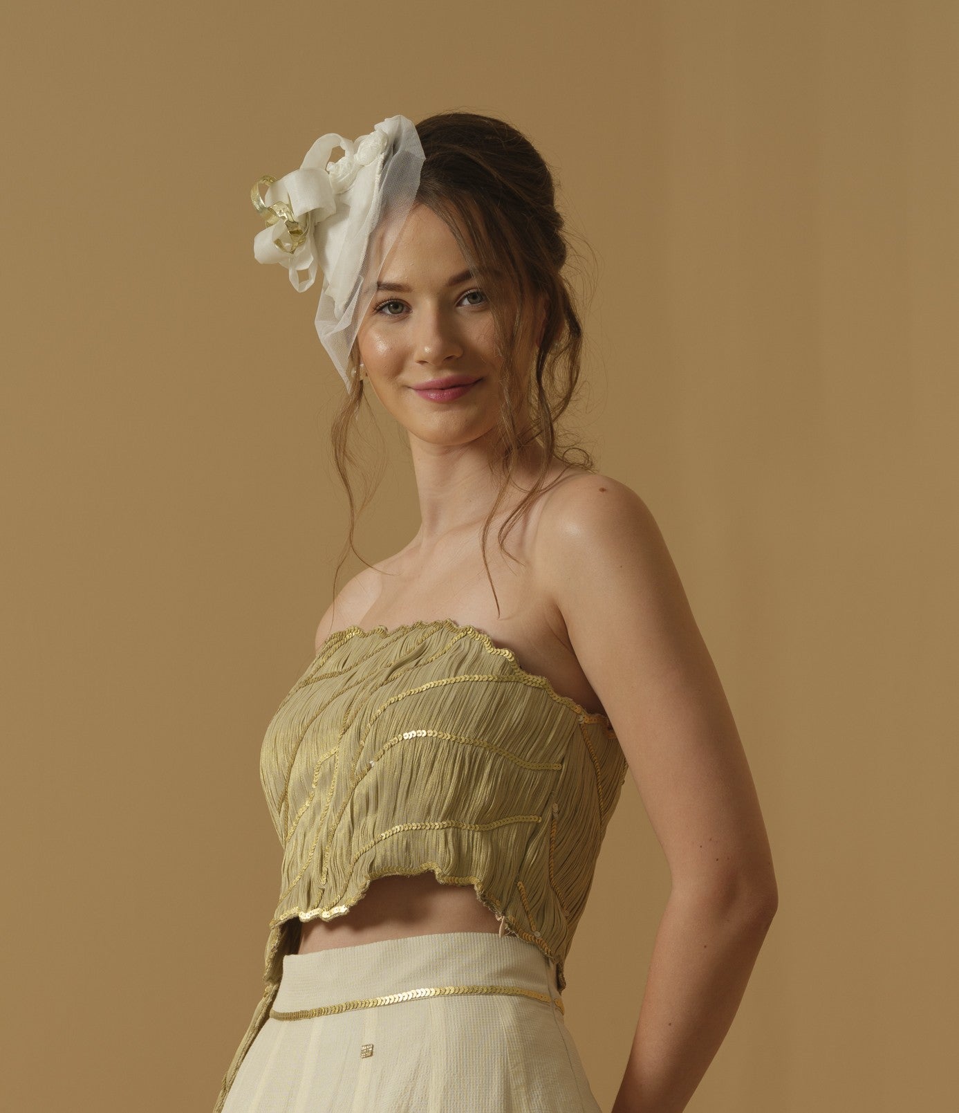 An Asymmetrical Ruched Tube Top