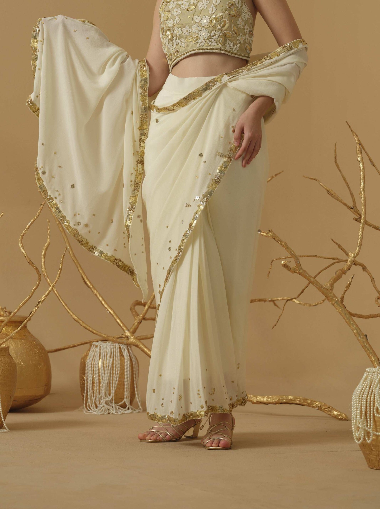 Featuring A Pre-Stitched Saree With A Geometrical Sequins Border