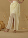 Draped Skirt With Slit Having A Brooch On The Side Of The Waist