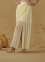 Draped Skirt With Slit Having A Brooch On The Side Of The Waist