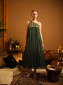 An asymmetric one-shoulder dress