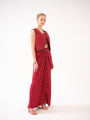 A three-piece set — jacket, bustier, and drape skirt