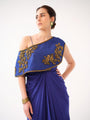 A one-shoulder silk capelet
