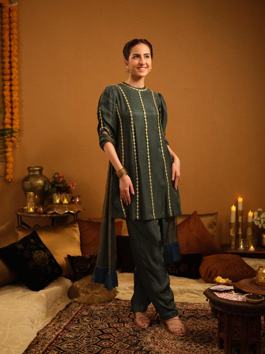 A twill kurta with gold bead embroidery