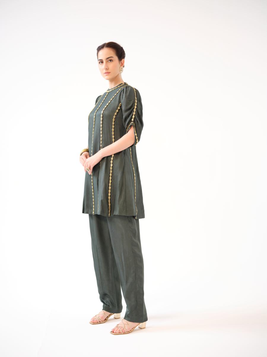 A twill kurta with gold bead embroidery