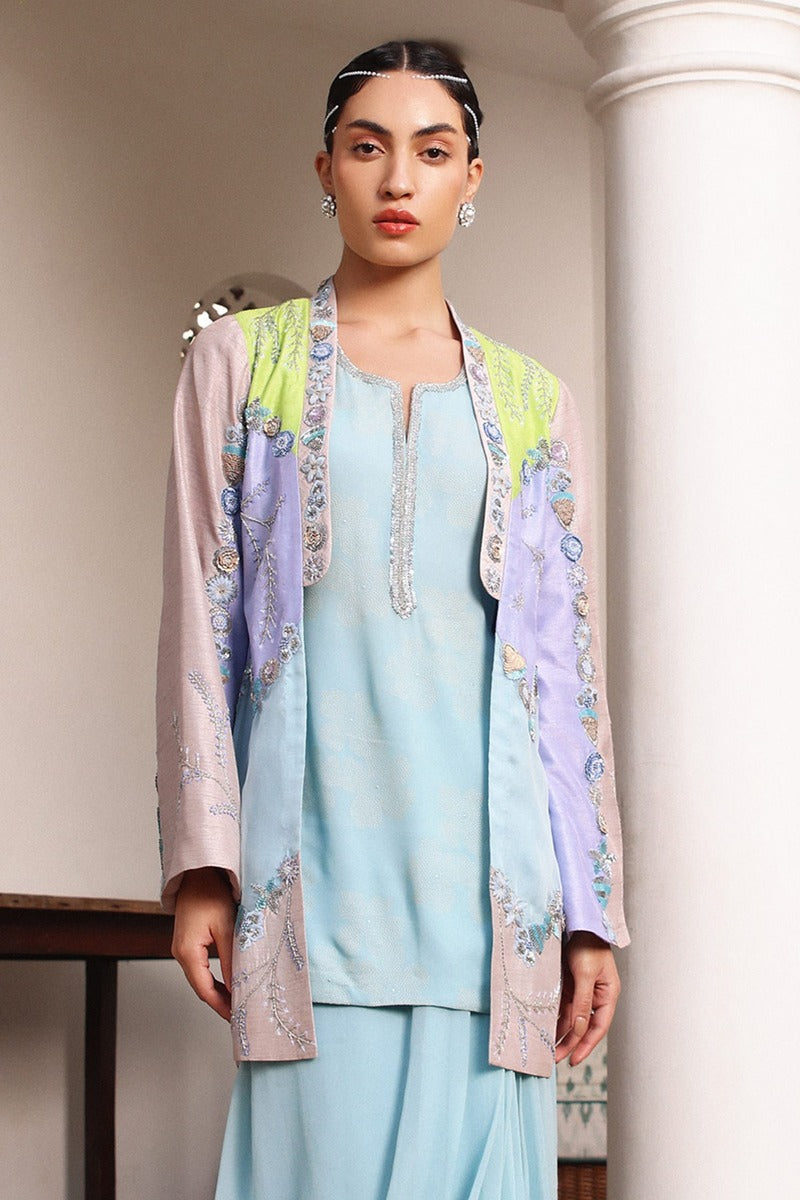 Interesting Combination of a Draped Skirt with a Long Tunic