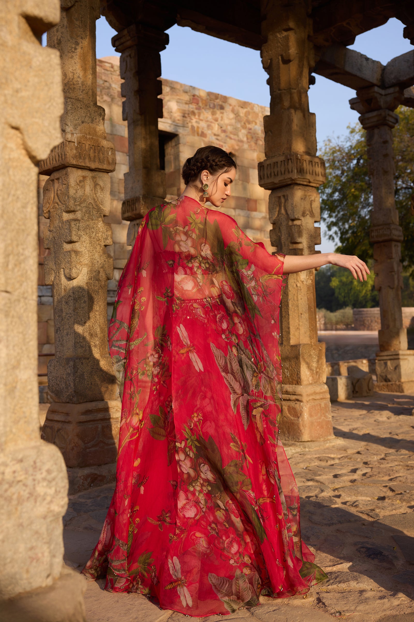 Fuchsia Printed Embellished Cape Set Paired With Skirt And Embellished Bustier