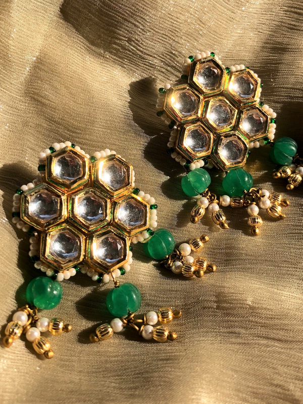 Beehive studs with green
 melon stones