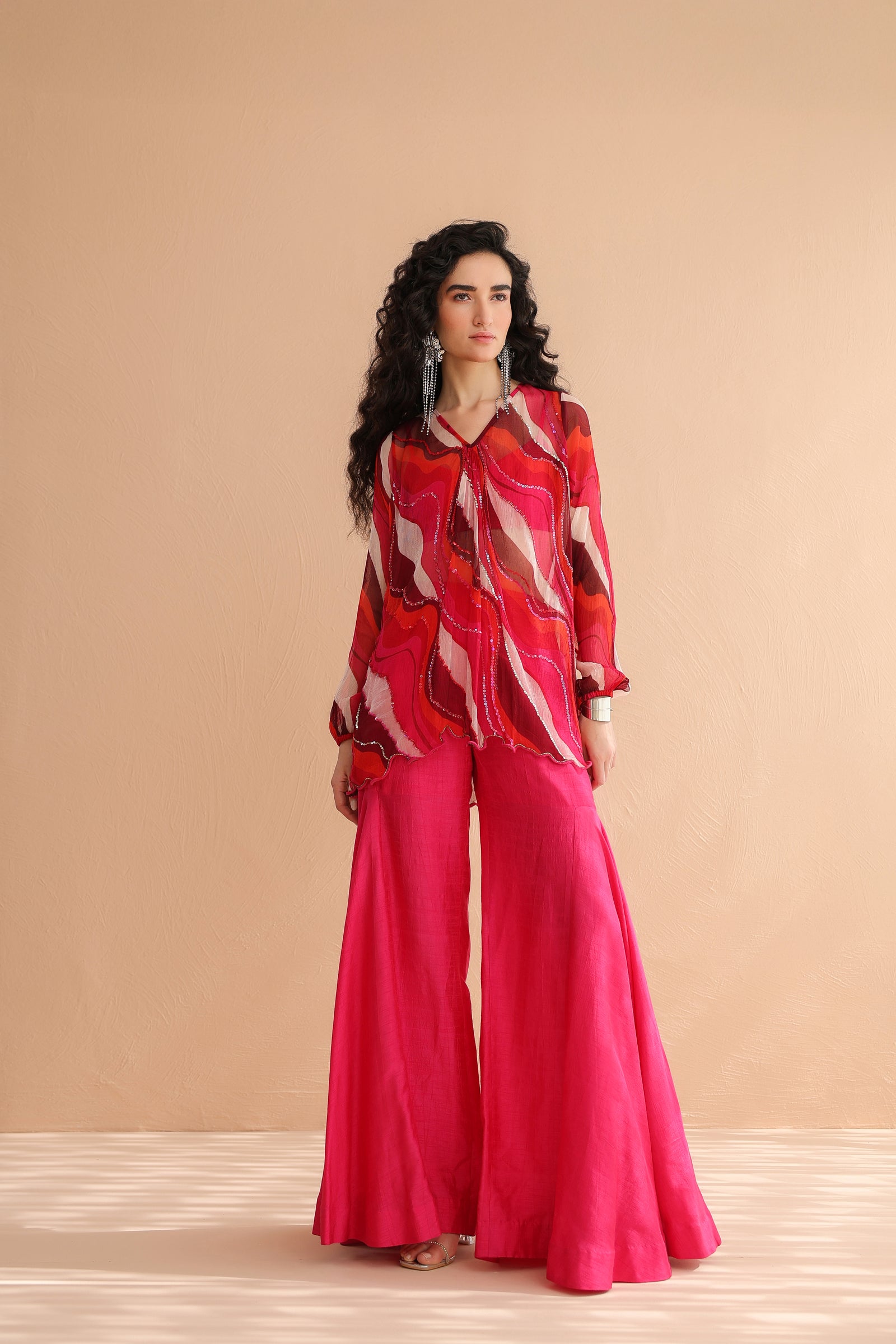 Bloody Mary tunic with exaggerated bell-bottoms.
