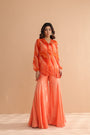 Tequila sunrise tunic with exaggerated bell-bottoms.