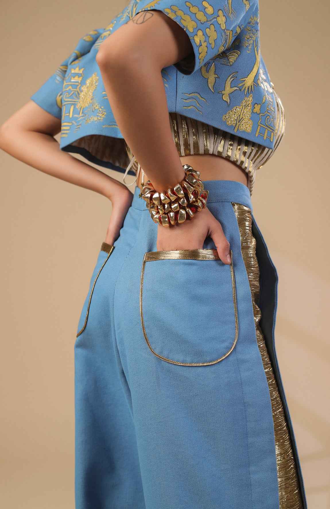 Denim Crop Jacket With Gold And Ivory Pleated Corset With Denim Pants