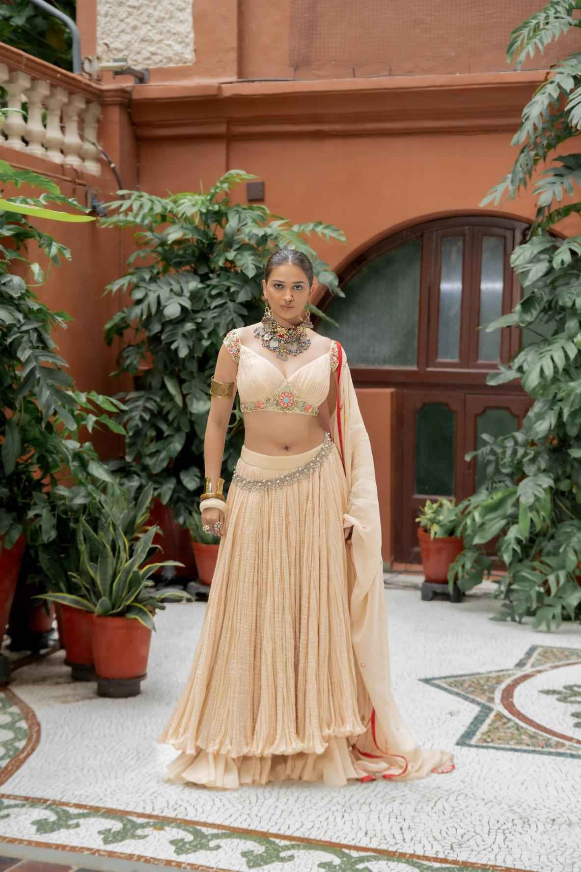 Beige Organza Lehenga Set Features a Pleated Blouse With Floral Embroidery