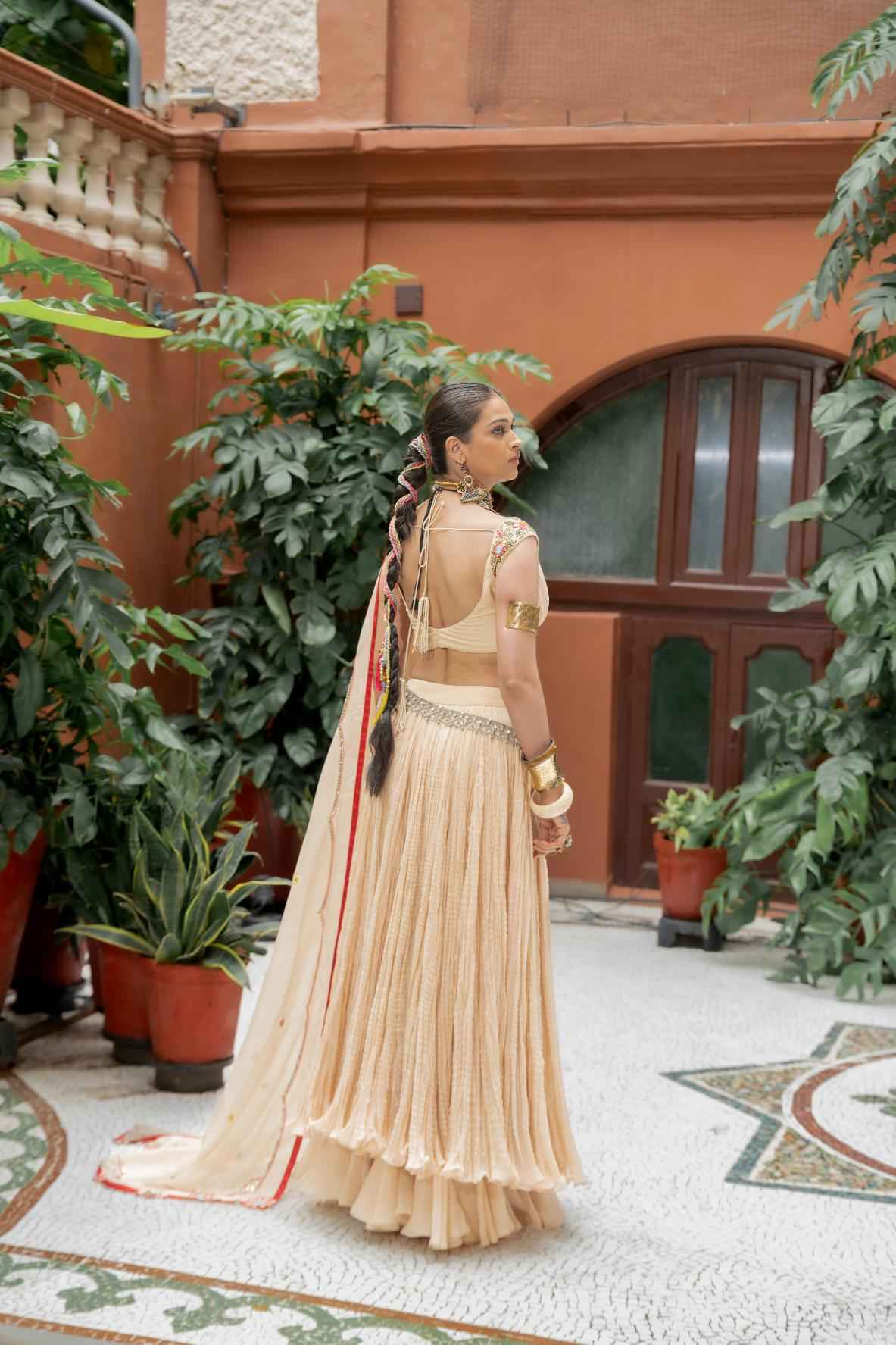 Beige Organza Lehenga Set Features a Pleated Blouse With Floral Embroidery