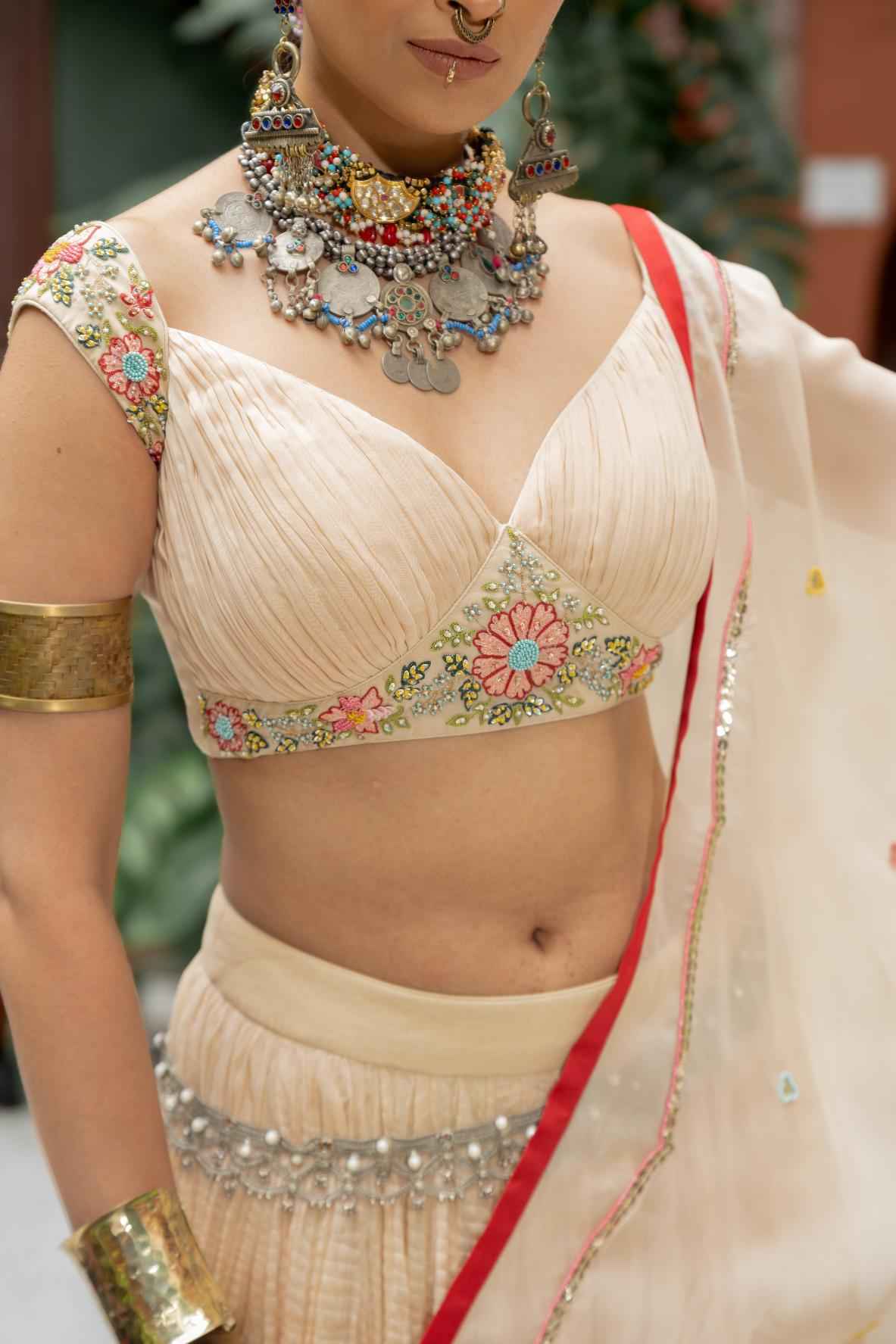 Beige Organza Lehenga Set Features a Pleated Blouse With Floral Embroidery