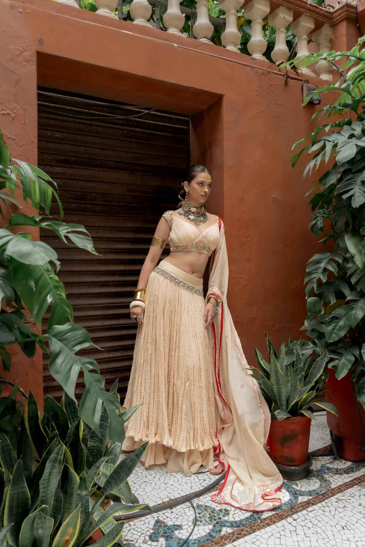Beige Organza Lehenga Set Features a Pleated Blouse With Floral Embroidery