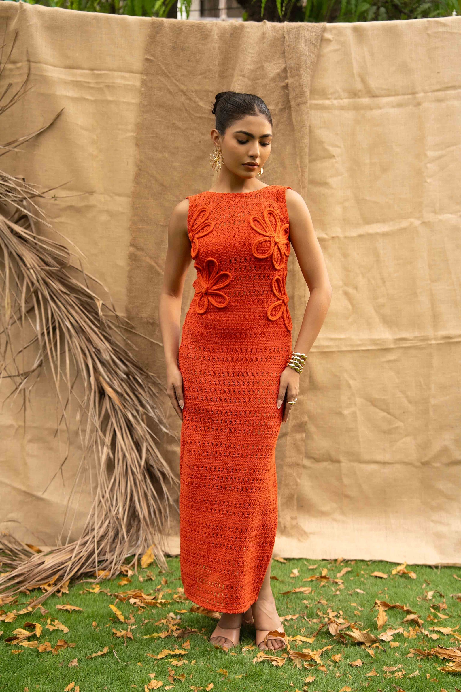 An Orange Knit Dress, Adorned With Hand Embrodiered