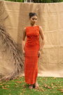 An Orange Knit Dress, Adorned With Hand Embrodiered