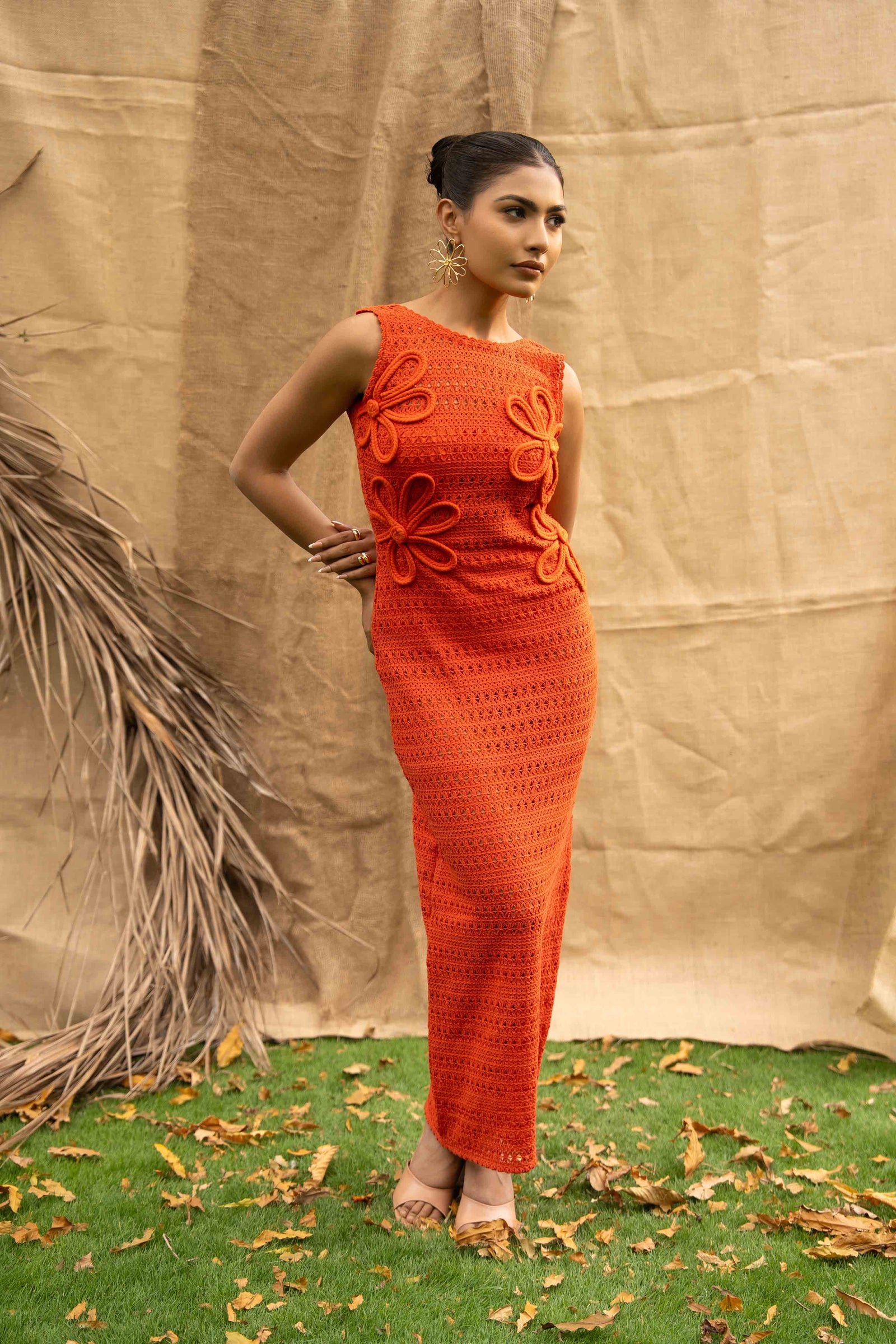 An Orange Knit Dress, Adorned With Hand Embrodiered
