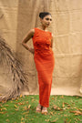 An Orange Knit Dress, Adorned With Hand Embrodiered