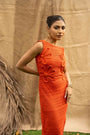 An Orange Knit Dress, Adorned With Hand Embrodiered