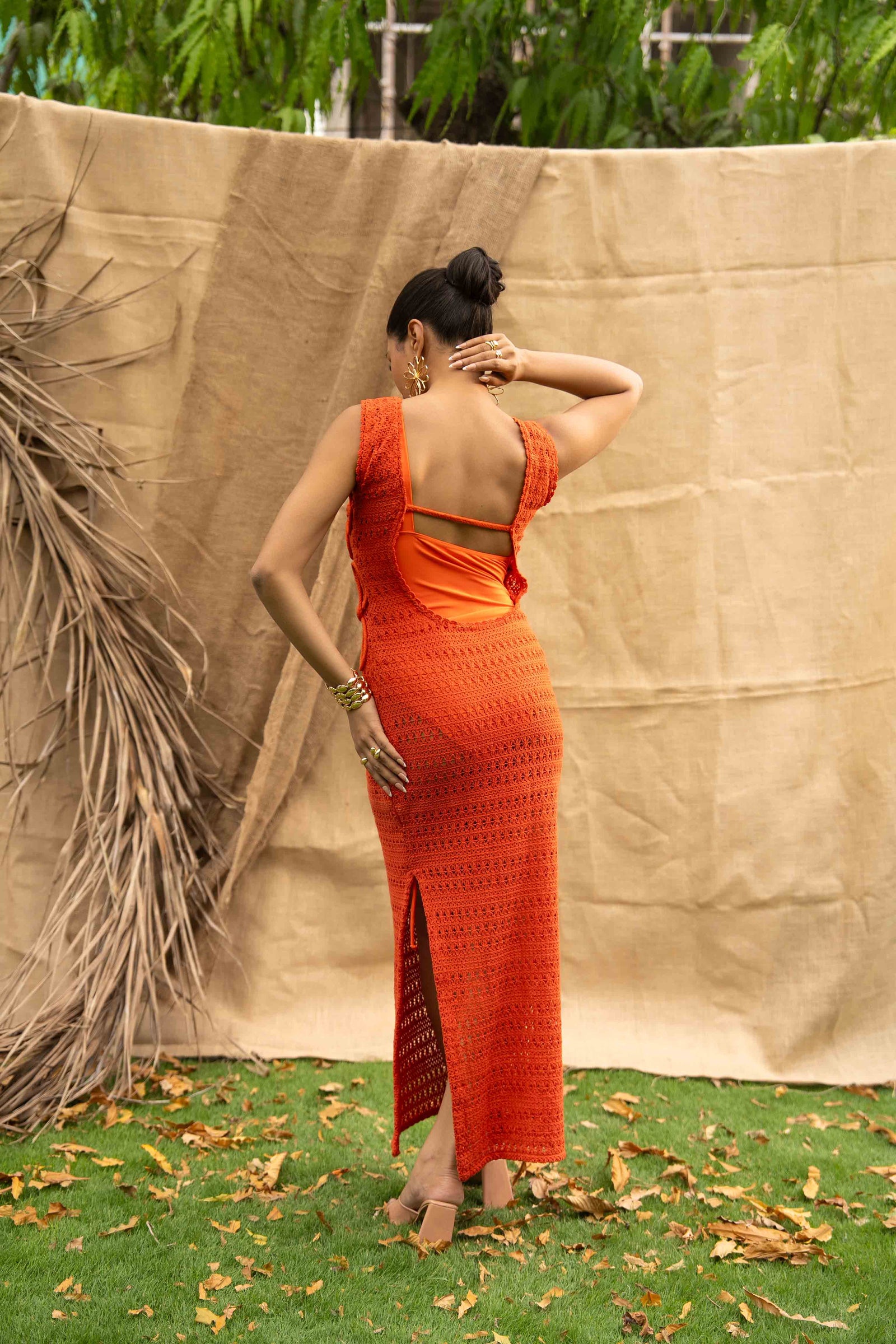 An Orange Knit Dress, Adorned With Hand Embrodiered