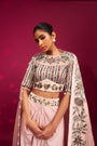 Peachy pink embellished ajrakh blouse with embroidered cape and dhoti