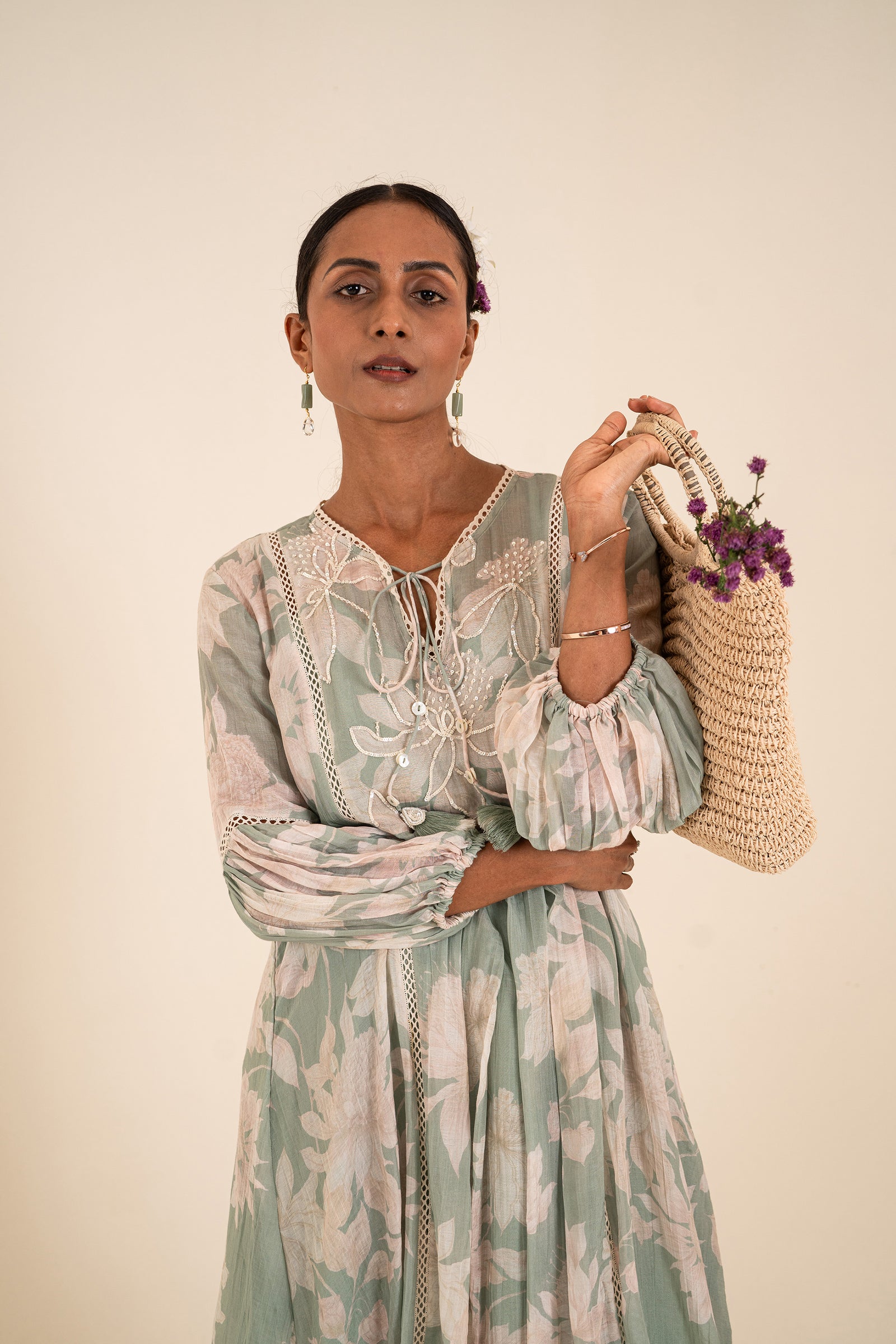 An Ocean Blue Floral Printed One Piece Embellished