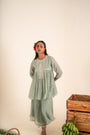 An Ocean Blue Peplum Set Embellished With Hand-Embroidery