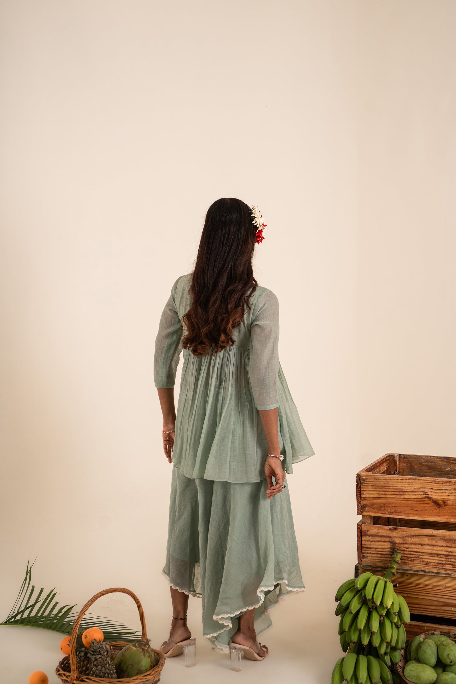 An Ocean Blue Peplum Set Embellished With Hand-Embroidery