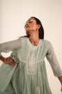 An Ocean Blue Peplum Set Embellished With Hand-Embroidery