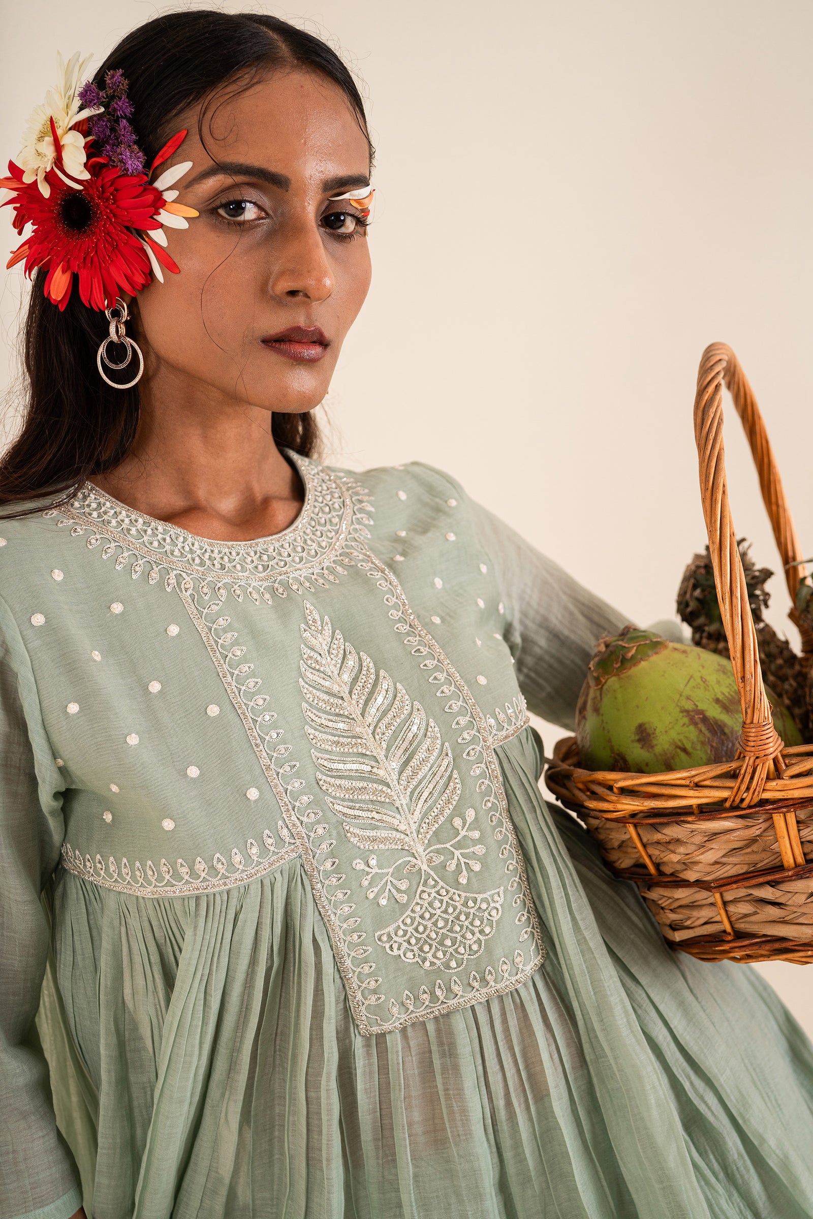 An Ocean Blue Peplum Set Embellished With Hand-Embroidery