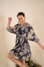 An Indigo Blue Floral Printed Tie-Up One Piece Dress With Tassels
