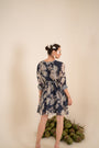 An Indigo Blue Floral Printed Tie-Up One Piece Dress With Tassels