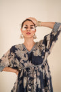 An Indigo Blue Floral Printed Tie-Up One Piece Dress With Tassels