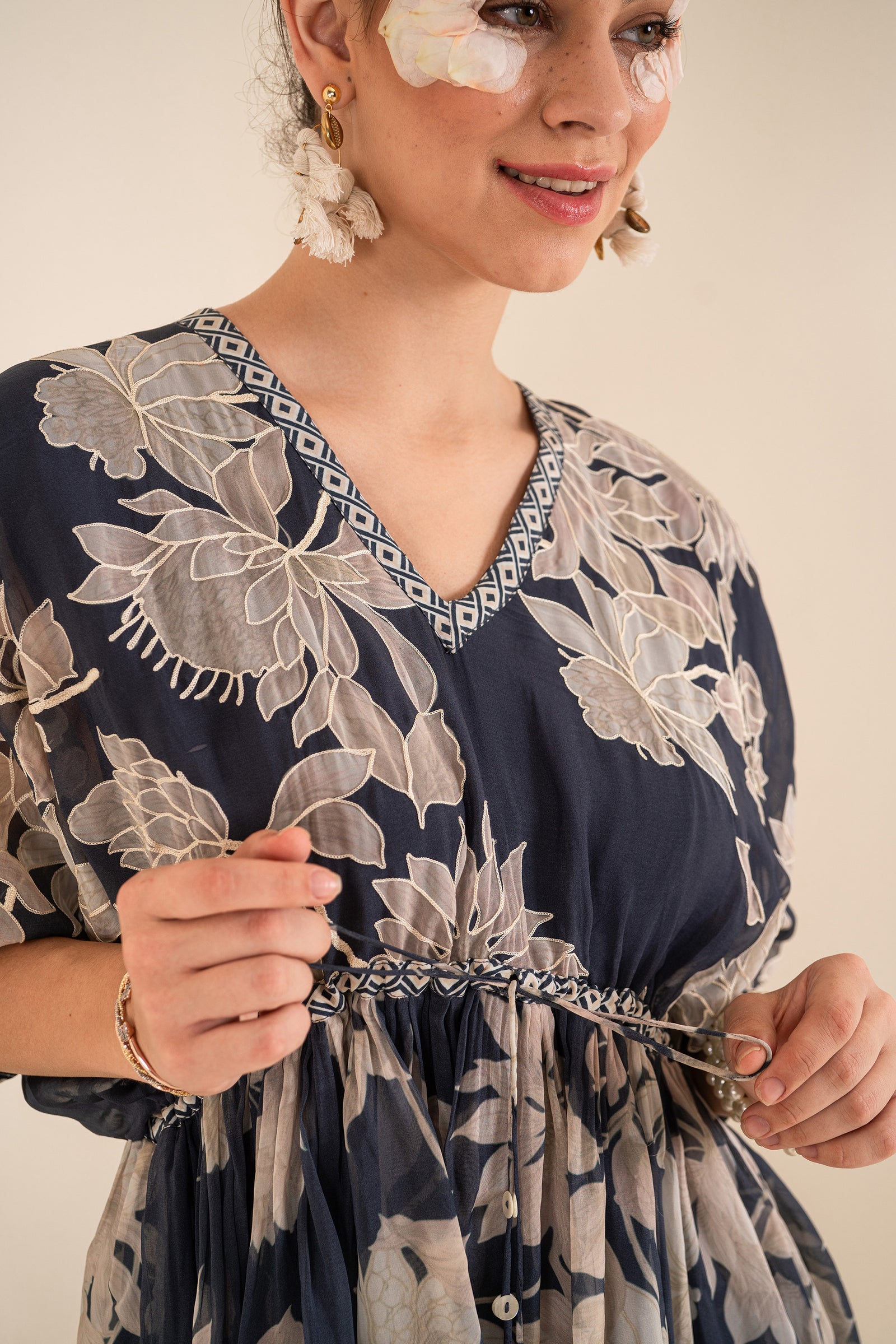 An Indigo Blue Floral Printed Tie-Up One Piece Dress With Tassels