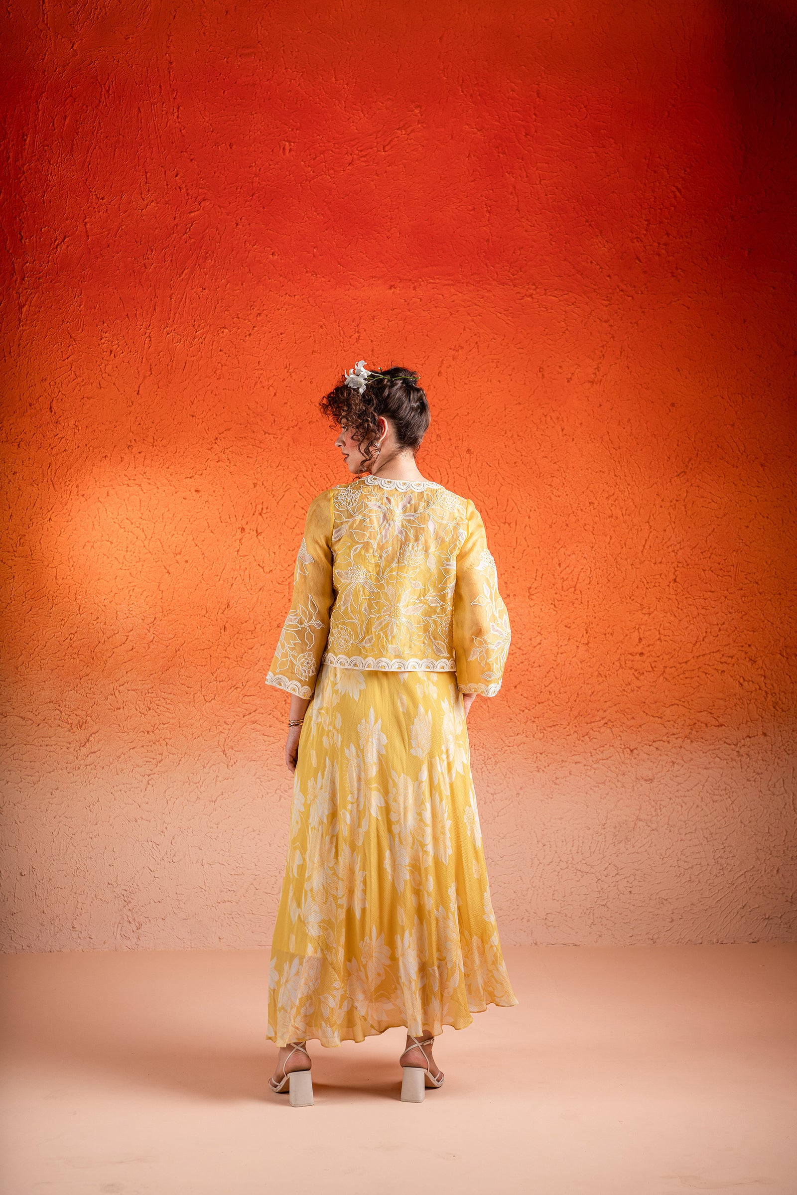 A Floral Printed A-Line Maxi Dress Paired With Handcrafted Jacket