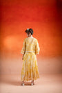 A Floral Printed A-Line Maxi Dress Paired With Handcrafted Jacket