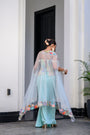 Gardenia Highlighted Corset With Dhoti Skirt And Cape