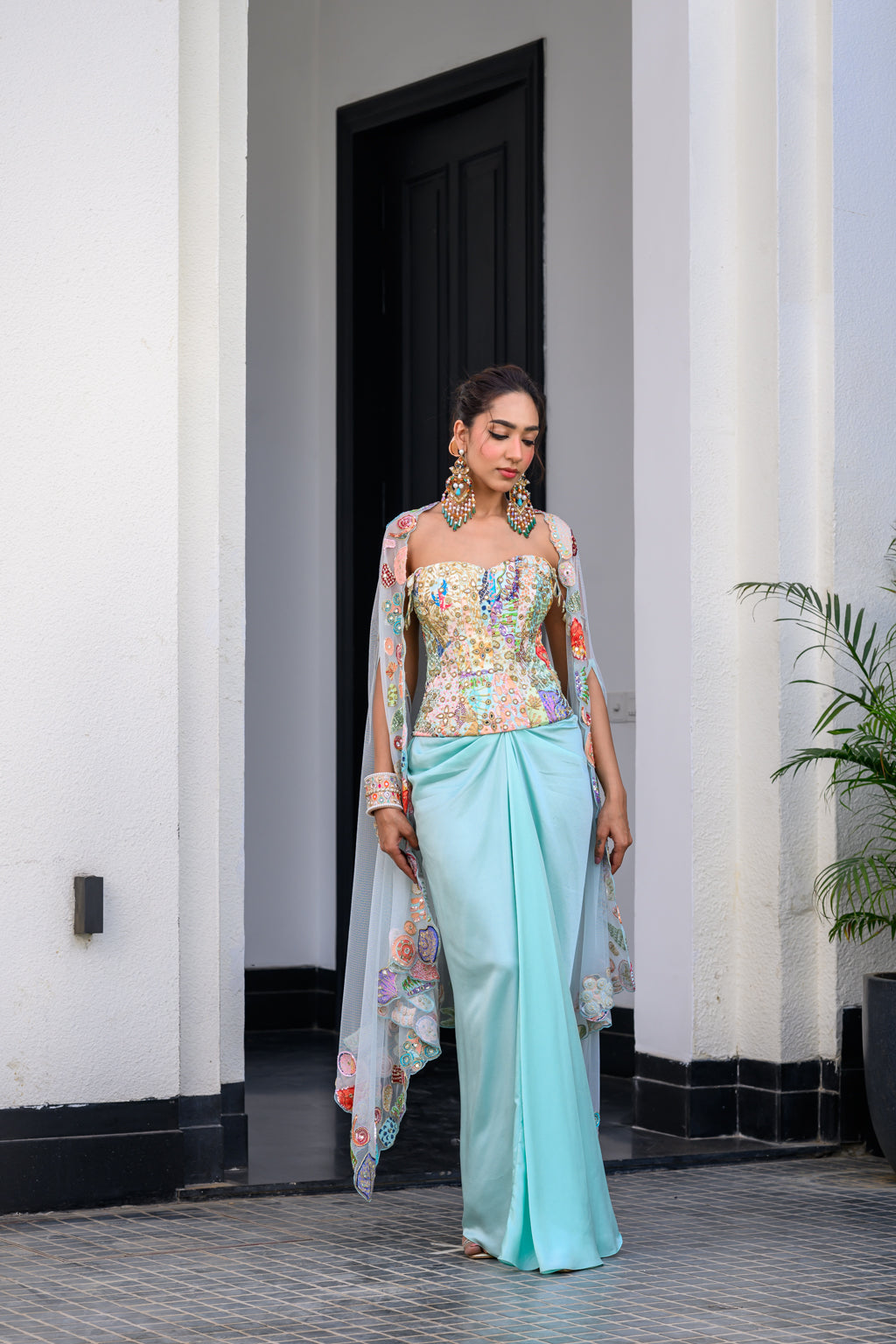 Gardenia Highlighted Corset With Dhoti Skirt And Cape