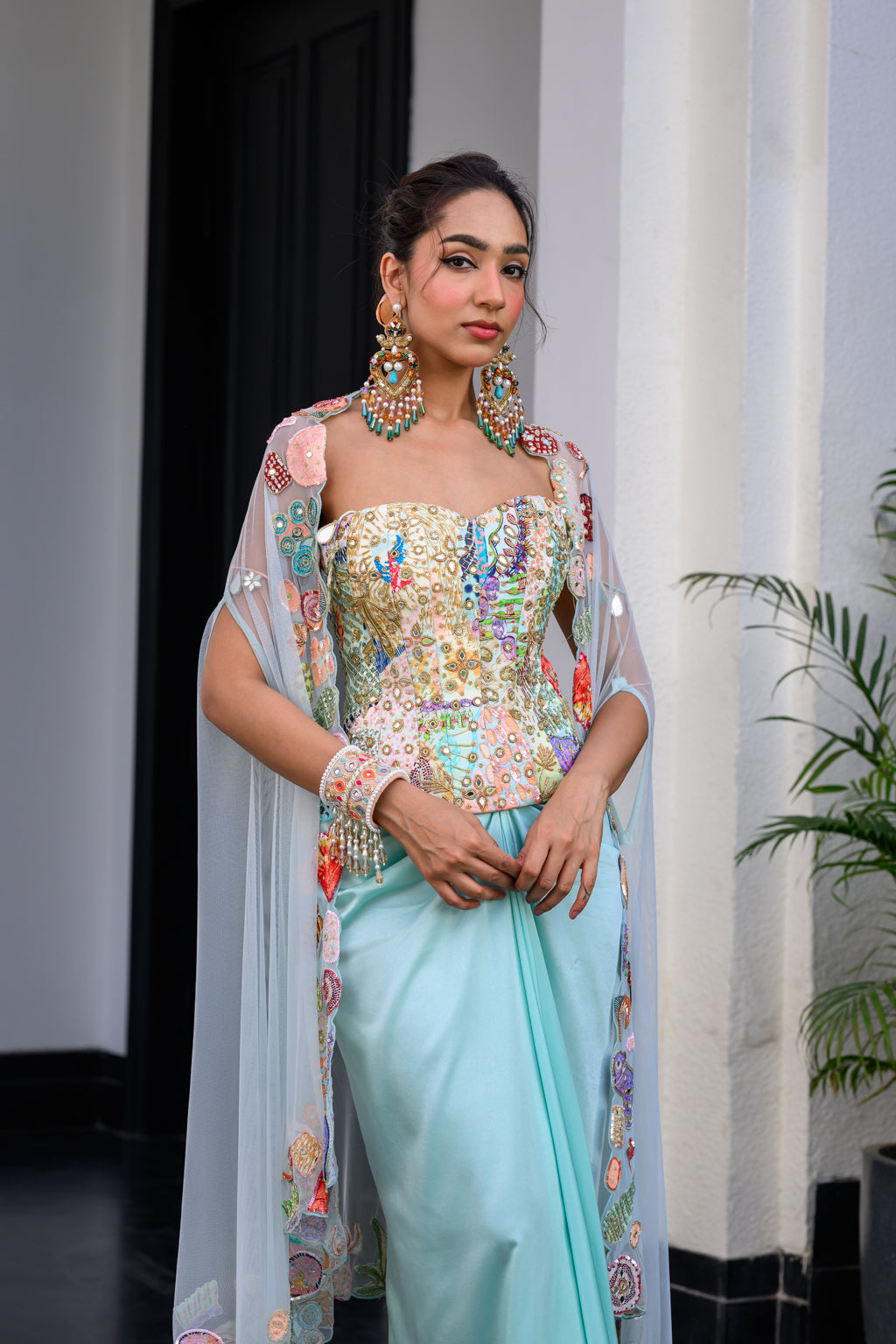 Gardenia Highlighted Corset With Dhoti Skirt And Cape