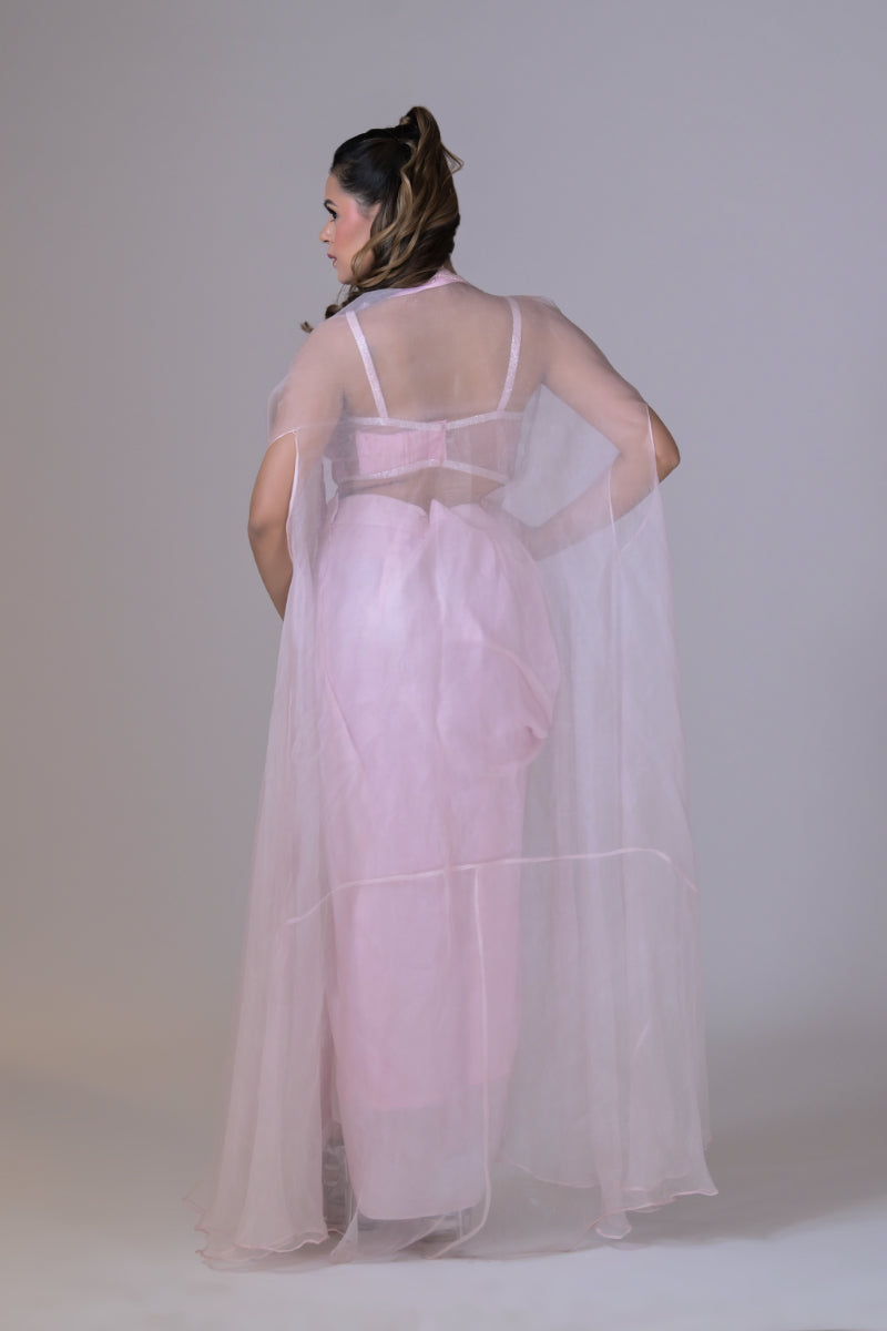 A pink organza cape and a crop blouse
