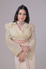 Ivory crop jacket with geometrical cutdana work and a crepe drape skirt