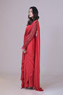 Red drape skirt and a hand beaded crop blouse