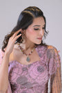 Plump pink 1 piece drape skirt with organza and cutdana work
